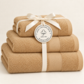 cashmere Sofia three towel set with ribbon and Giza Cotton Hub circular tag