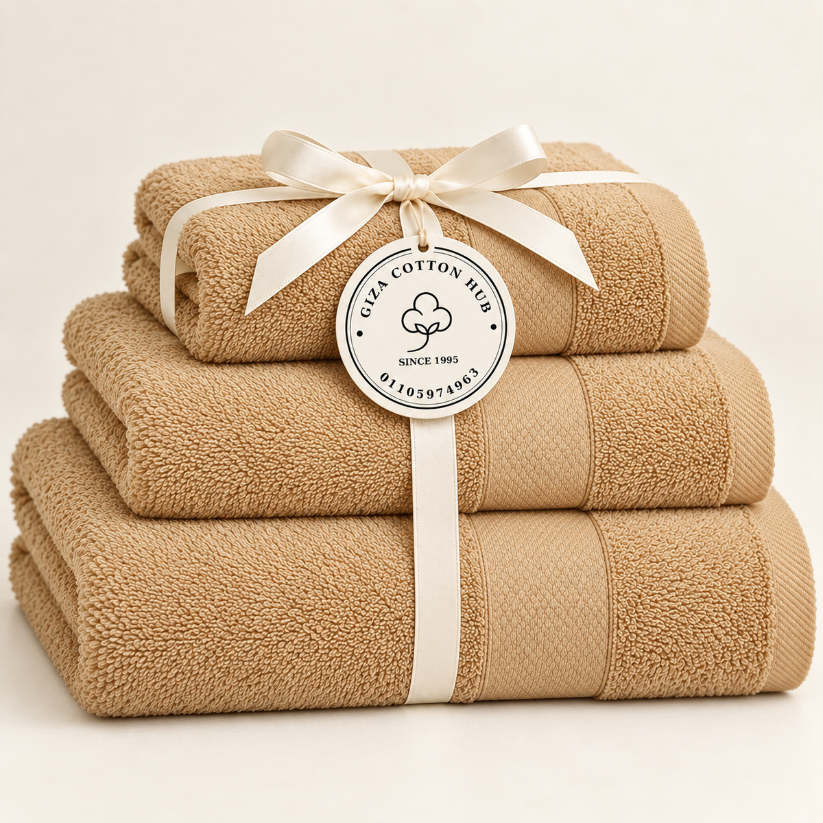 cashmere Sofia three towel set with ribbon and Giza Cotton Hub circular tag