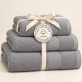 gray Sofia three towel set with ribbon and Giza Cotton Hub circular tag